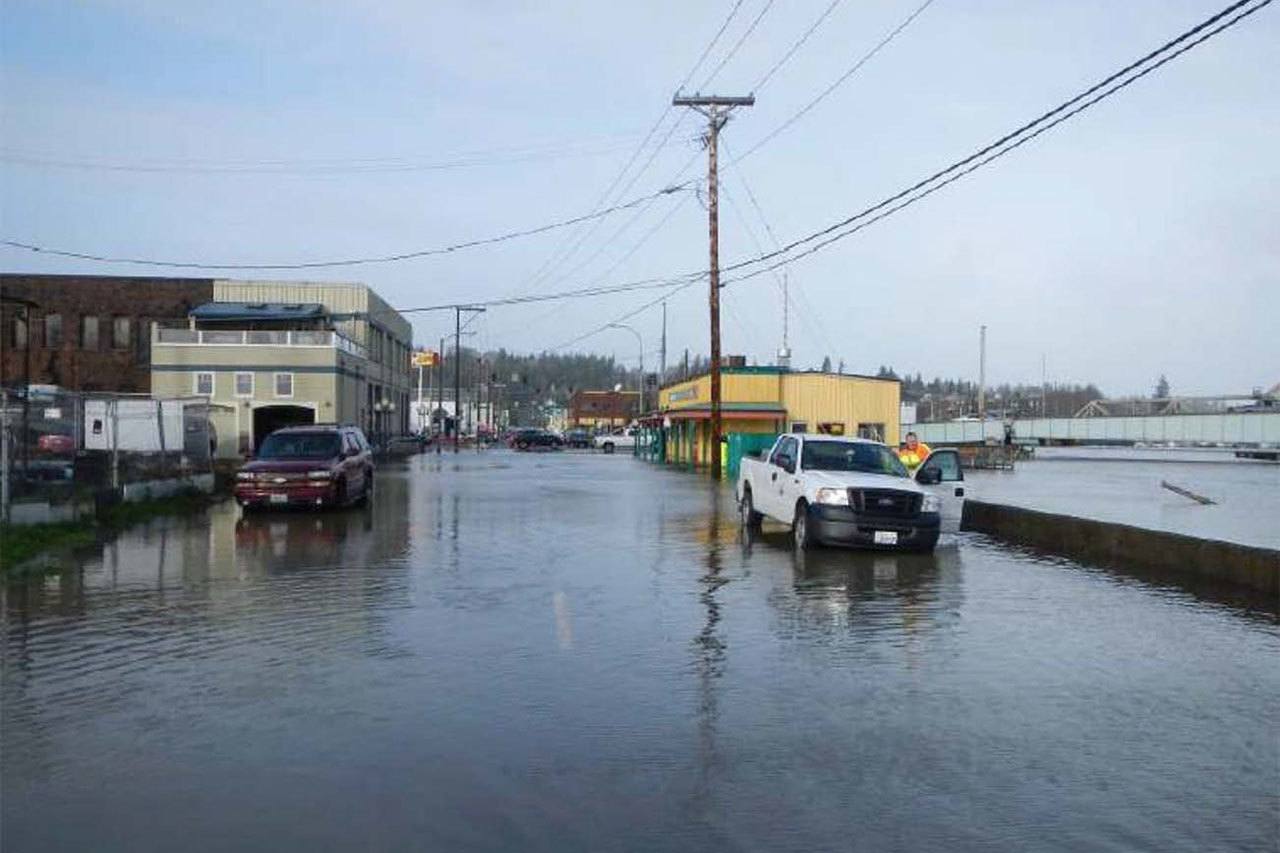 Courtesy city of Aberdeen Flooding on F Street in Aberdeen on Dec. 10, 2015 near the Wishkah River. Work to improve conditions in parts of Aberdeen and Hoqiuam is being planned.