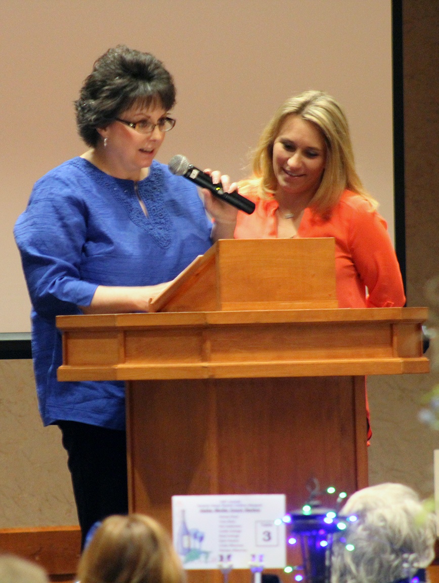 Angelo Bruscas/North Coast News: County Commissioner Vickie Raines presents the Small Business of the Year Award to D4 Sports and Kellie Daniels during the 125th Leaders Banquet and Business Recognition Awards presented by Greater Grays Harbor Inc. at the Quinault Beach Resort and Casino Frday Oct. 14, 2016.