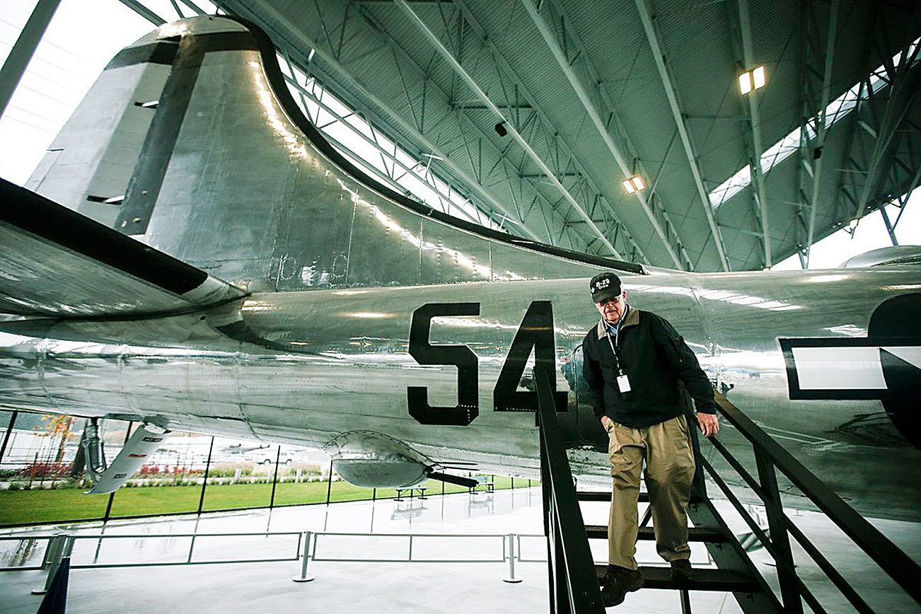 Volunteer Dale Thompson, of Seattle, walks down stairs from the rear of the restored T-Square 54 Boeing B-29 airplane on Thursday. The airplane went on public display in the Museum of Flight Aviation Pavilion in Seattle in April. (Ian Terry / The Herald)