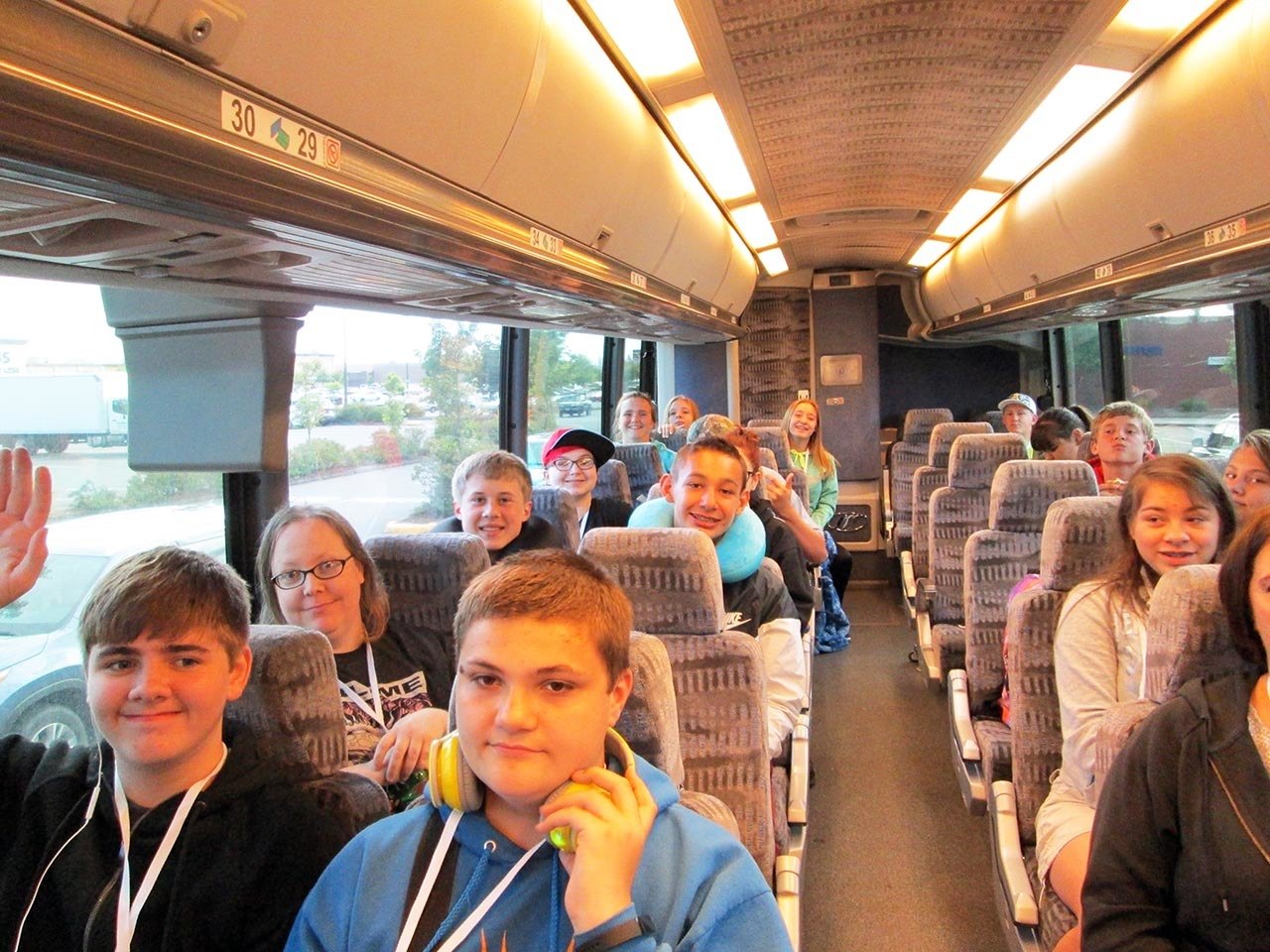 (Laura Carle/Contributed Photo) Miller Junior High School students pose for a photograph on a bus that took them to the airport in June 2016 for a week long trip to Washington D.C. and New York City. Efforts have begun to plan and raise funds for the June 2018 learning adventure.