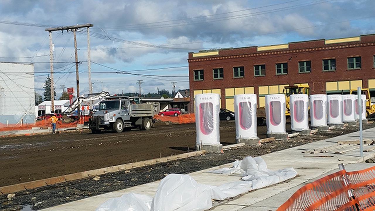 Work continued Friday on the Tesla Supercharger station in downtown Aberdeen. (Terri Harber|The Daily World)