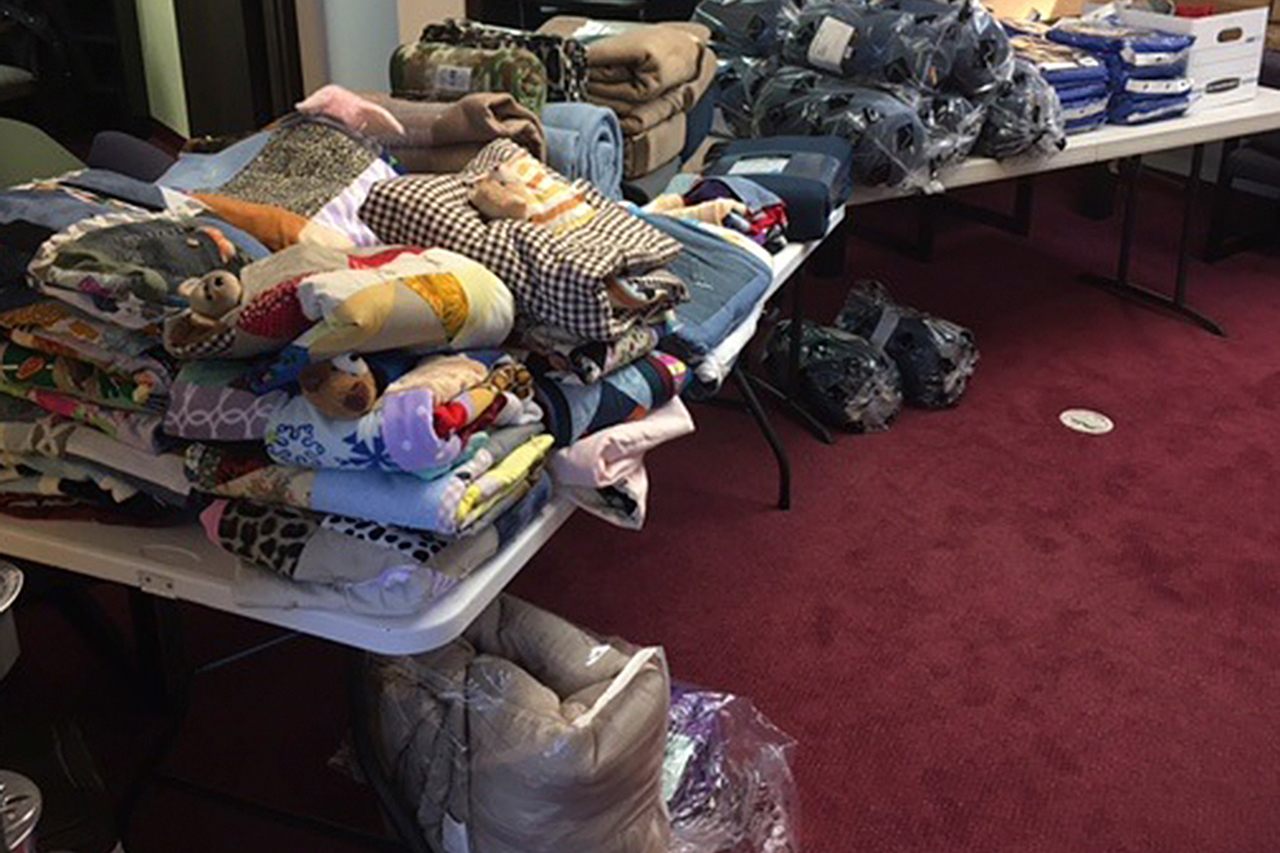 Blankets and sleeping bags were distributed to the area’s needy recently in a partnership between ASAP Business Solutions and The United Way.