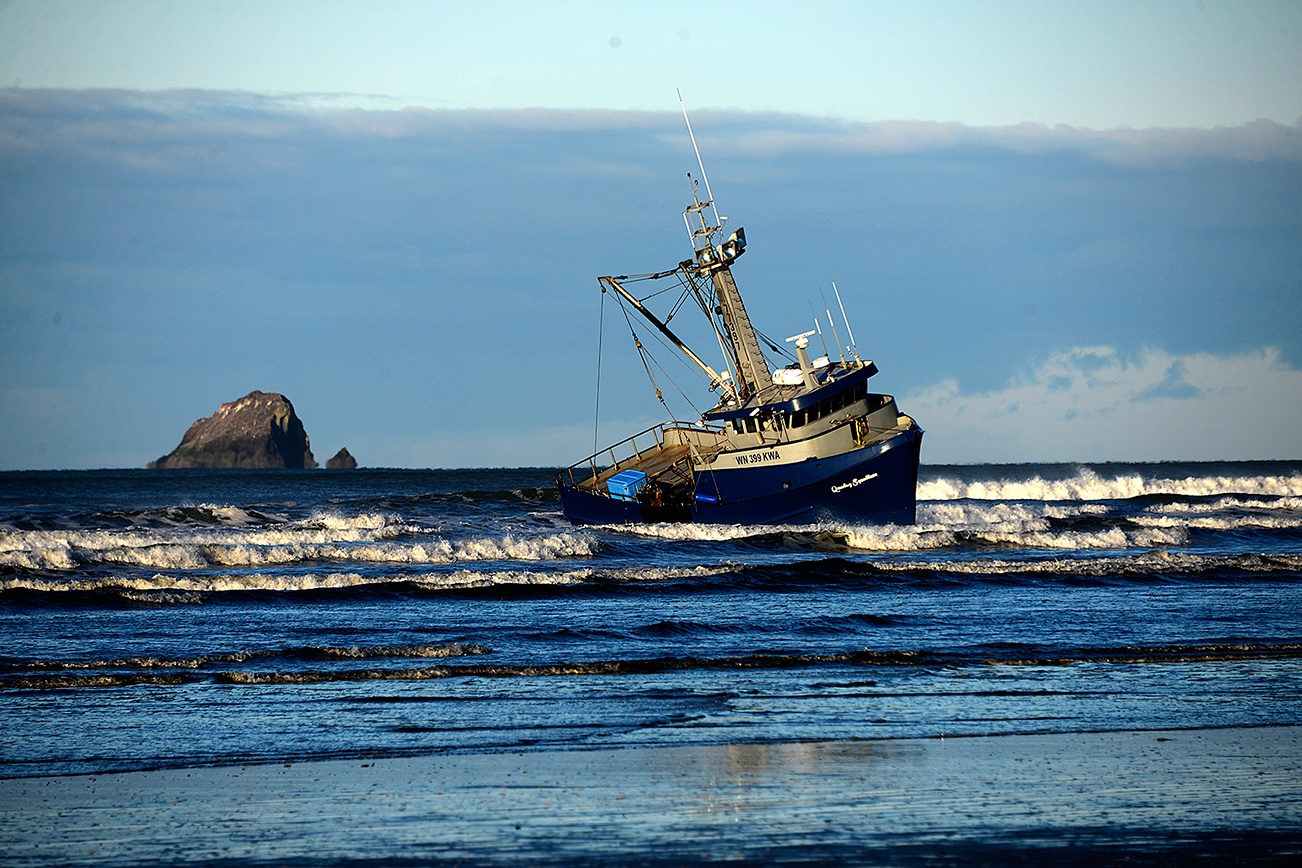 Five fishermen rescued from boat aground on the North Beach