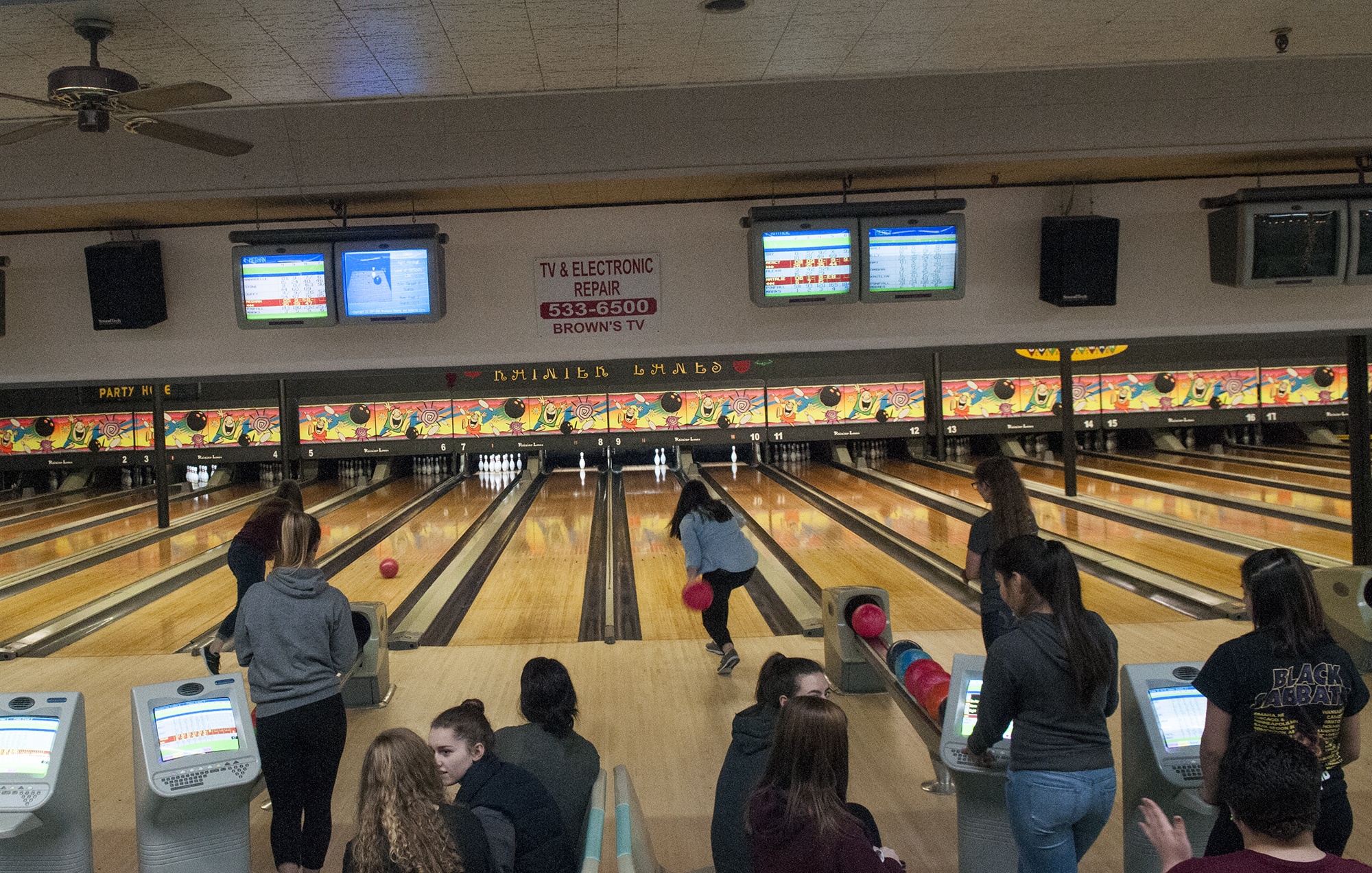 (Brendan Carl | The Daily World) The Aberdeen High School girls bowling team occupies the middle four lanes at Rainier Lanes in Aberdeen during a practice in Wednesday.