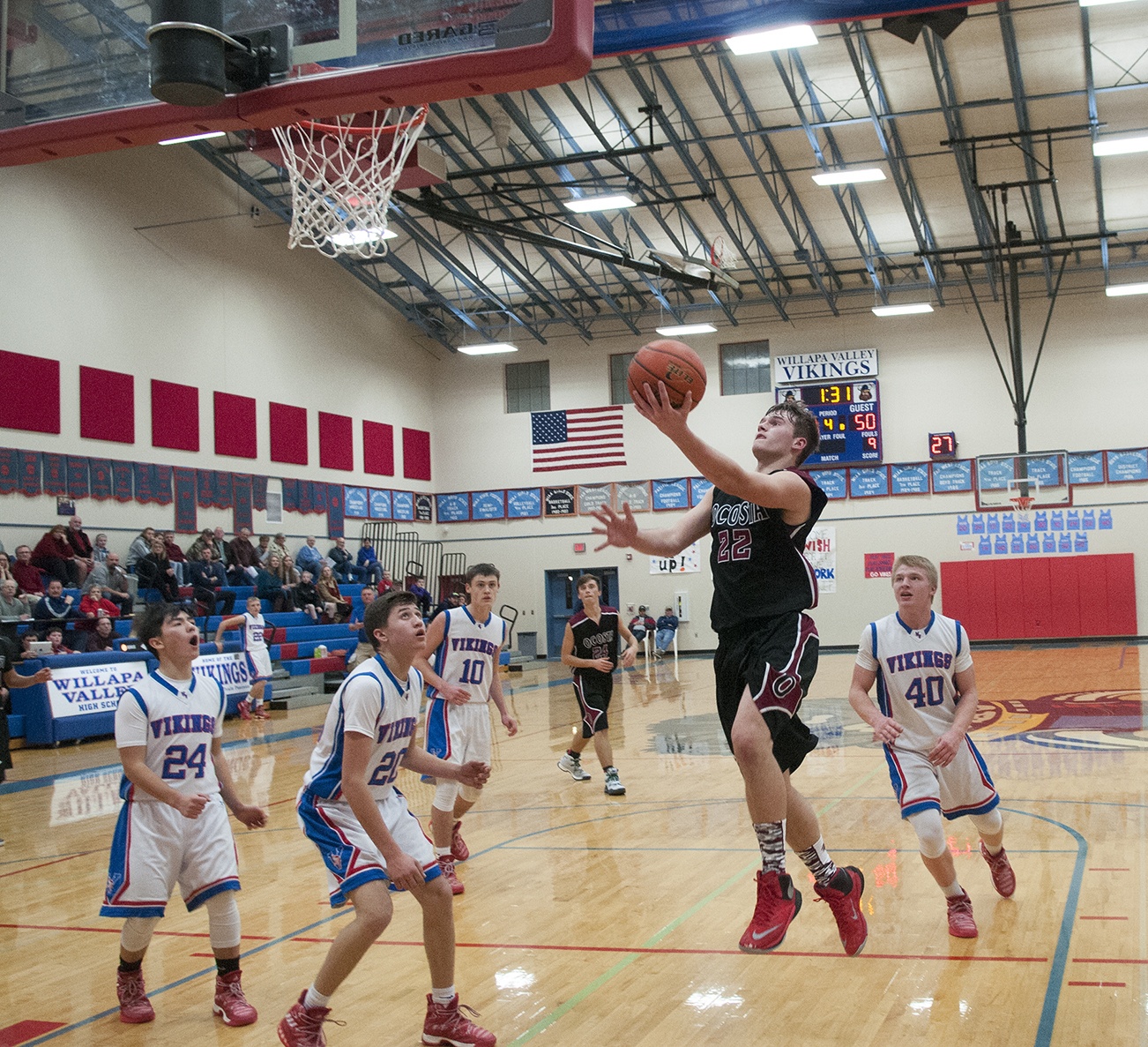 (Brendan Carl | The Daily World) Ocosta’s Paul Bjornsgard soars in for the game-winning lay up against Willapa Valley in a Pacific 2B League game at Tenoski Gym on Monday.
