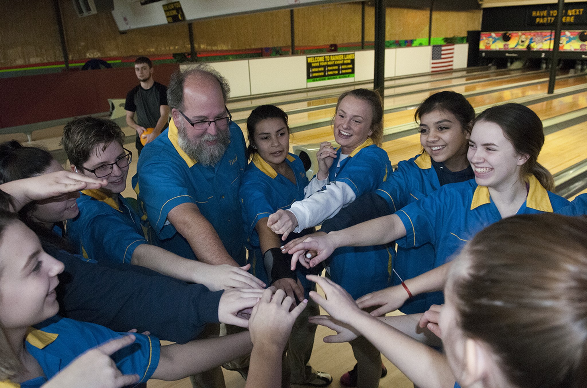(Brendan Carl | The Daily World) Aberdeen’s girls bowling team get together for a cheer prior to the start of Thursday’s non-league dual meet against Capital at Rainier Lanes. The Bobcats finished their regular-season schedule with a 5-0 dual meet sweep of the Cougars.