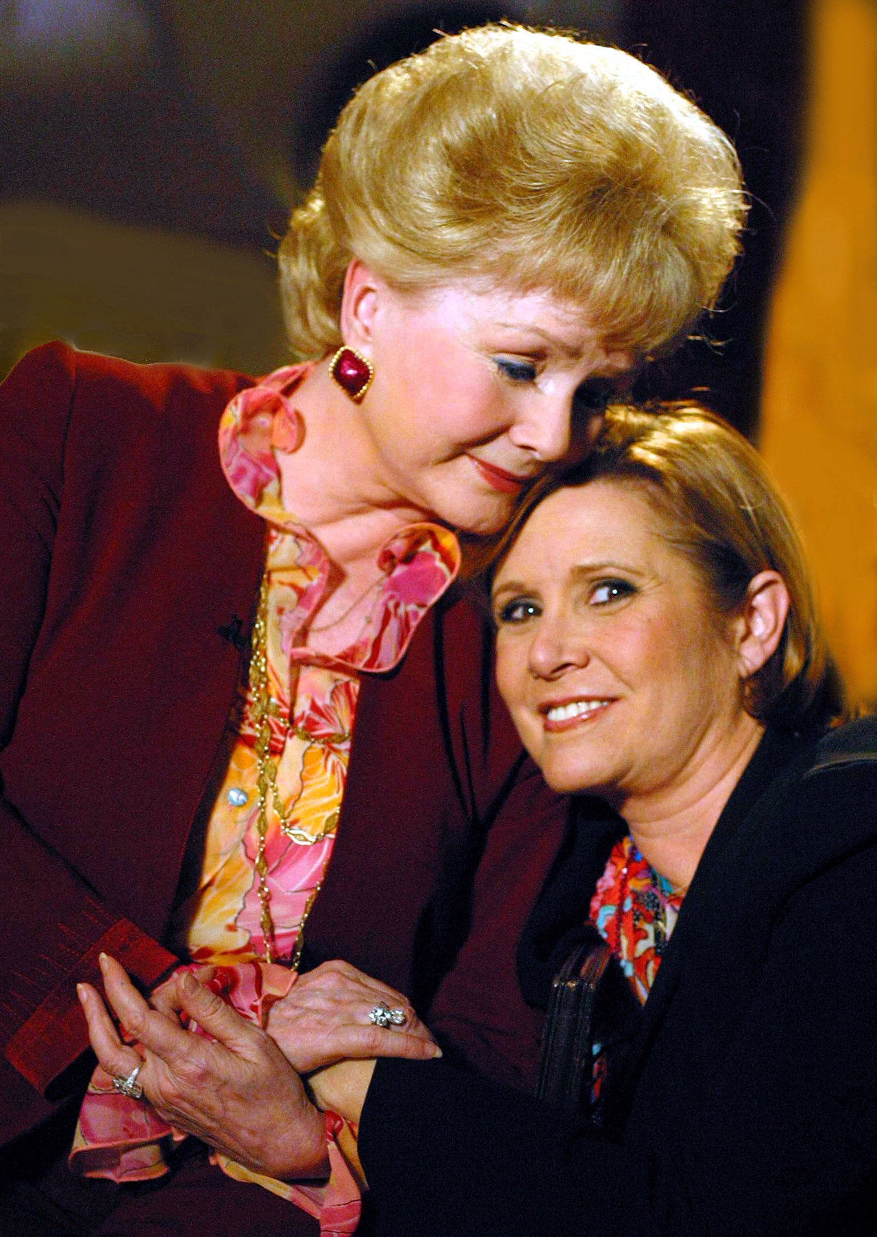 Debbie Reynolds (left) and her daughter, Carrie Fisher.