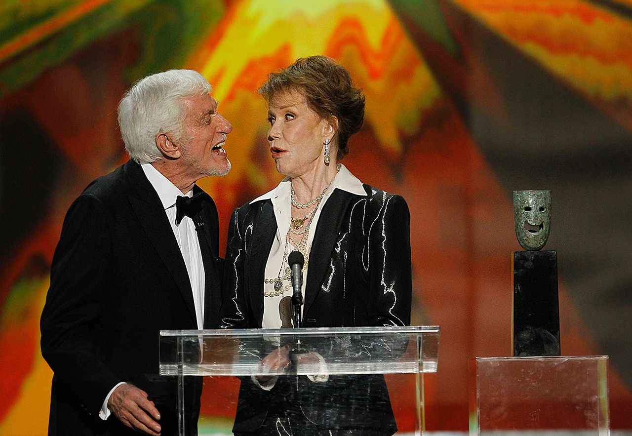 Mary Tyler Moore accepts her Lifetime Achievement Screen Actors Guild award from Dick Van Dyke during the 18th Annual Screen Actors Guild Awards show on Jan. 29, 2012, at The Shrine Auditorium in Los Angeles. (Robert Gauthier/Los Angeles Times)