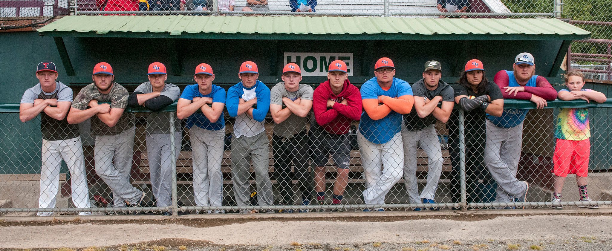 (Brendan Carl | The Daily World, file) Grays Harbor Longshore’s, left to right, Aidan Arrington, Kolby Standstipher, Chase McCarthy, Brandon Rogers, Jake Herzog, Justin Spencer, Jace Varner, Oscar Escalante, Camden Anderson, Austin Silva, Kyle Standstipher and bat kid Emmie Spencer line up on the top step of the dugout before practice at Olympic Stadium. The Senior Babe Ruth baseball team was the first Harbor-based team to win a Senior Babe Ruth regional pennant and was honored as The Daily World’s Team of the Year for 2016.