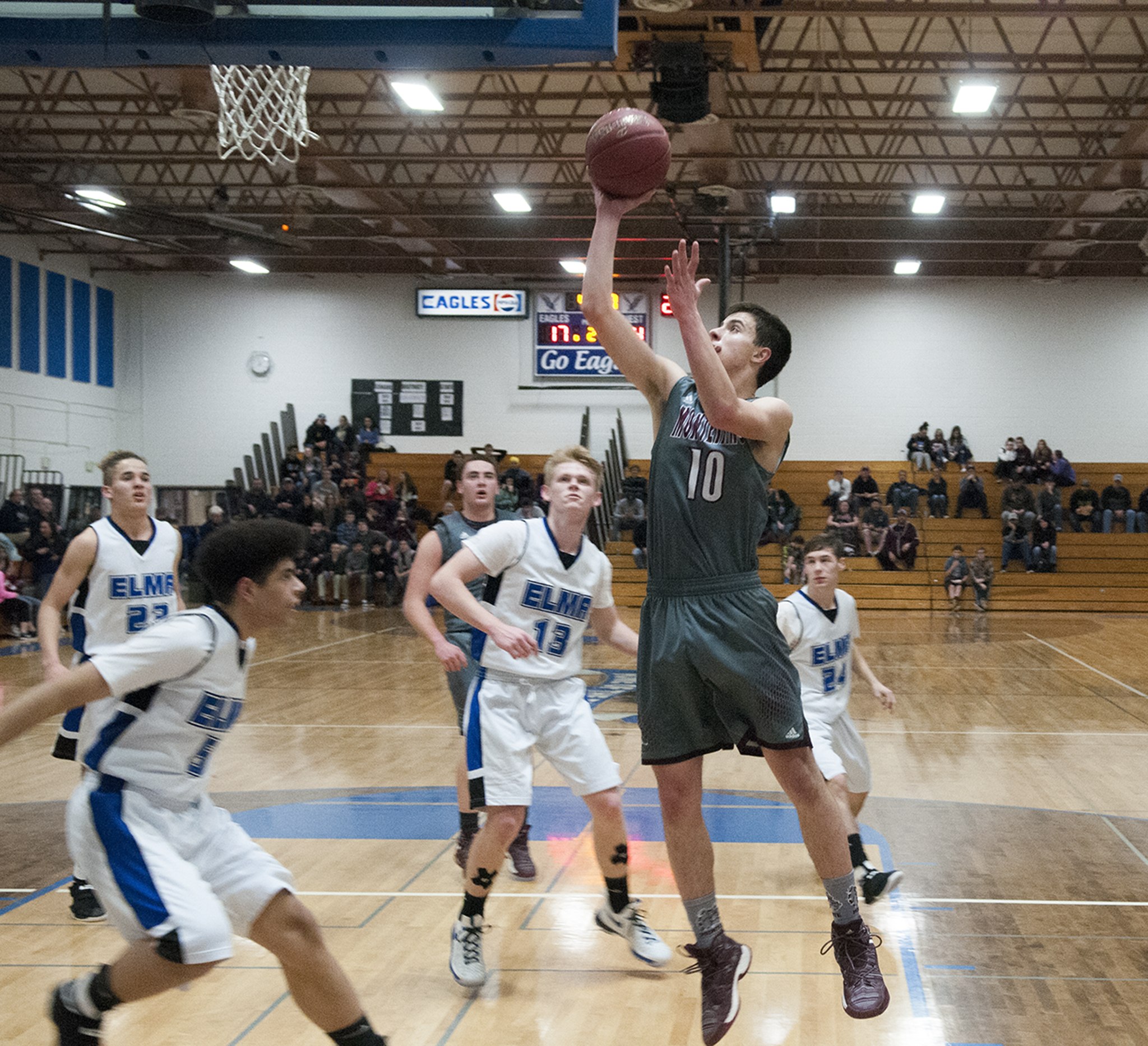 (Brendan Carl | The Daily World)                                Montesano’s Trevor Ridgway puts up a layup against Elma in an Evergreen 1A League game at Elma on Wednesday.