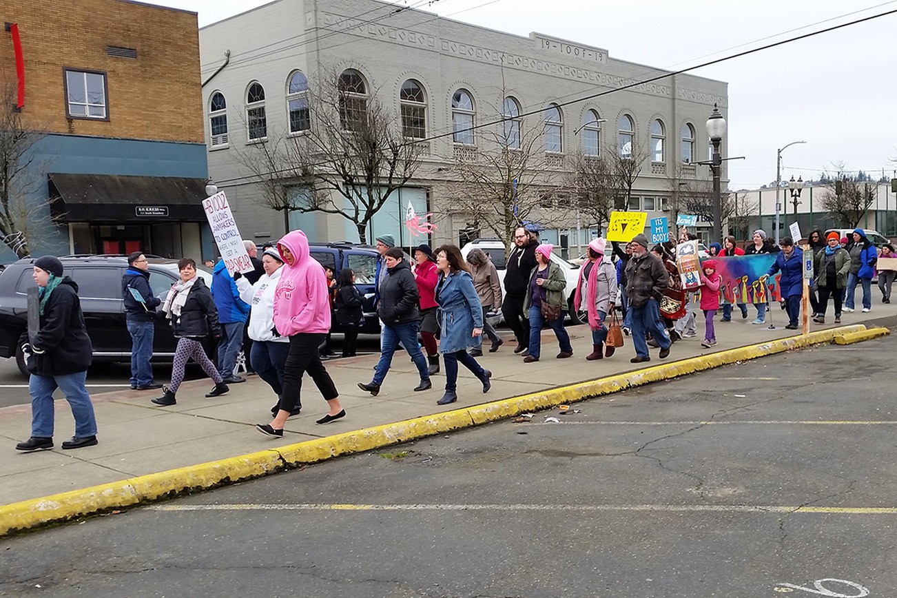 Some of the marchers participating in a demonstration against State Legislative House Bill 1002 and 1003, both of which focus on abortion, in downtown Aberdeen on Saturday. (Terri Harber|The Daily World)