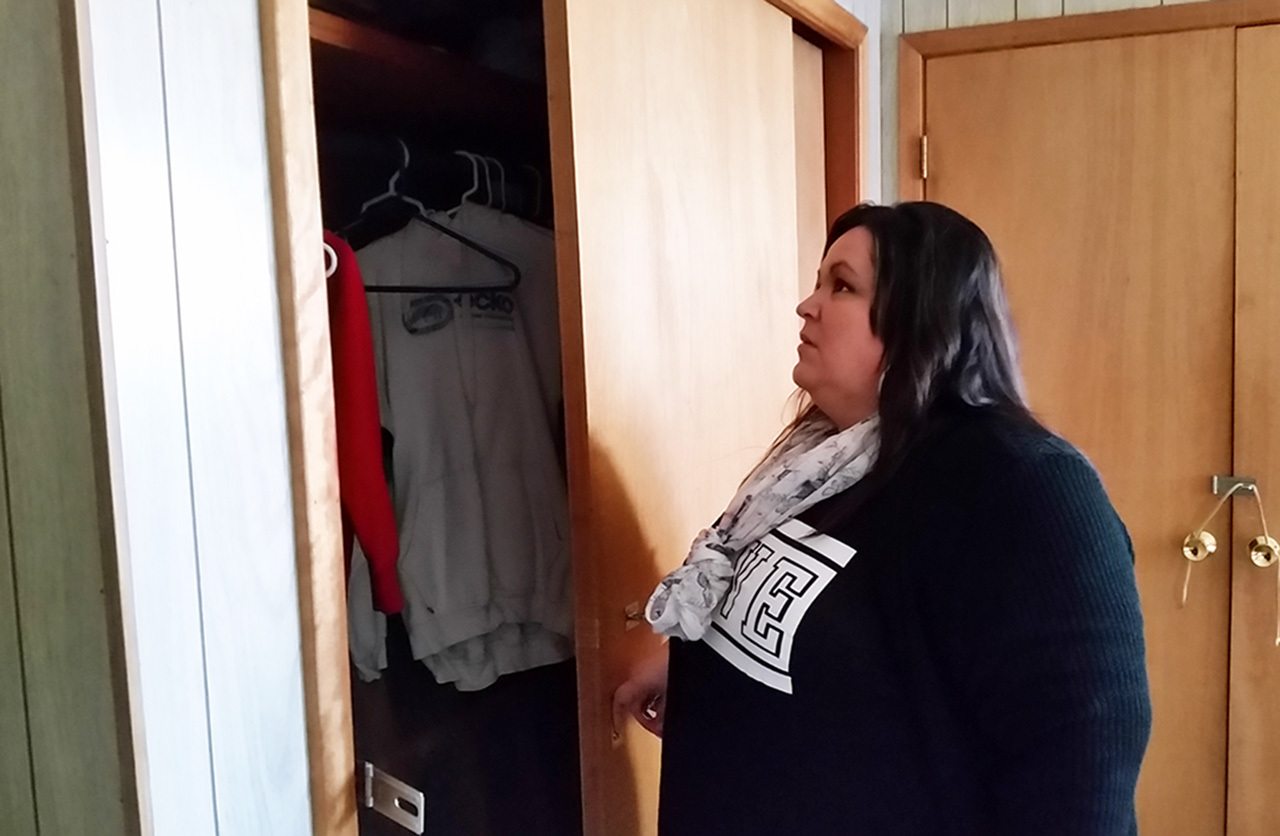 Jennifer Chuks Nwokike looks inside of a closet at Esther House in Aberdeen. This new church-run shelter focuses on providing temporary shelter to women and young children. (Terri Harber|The Daily World)