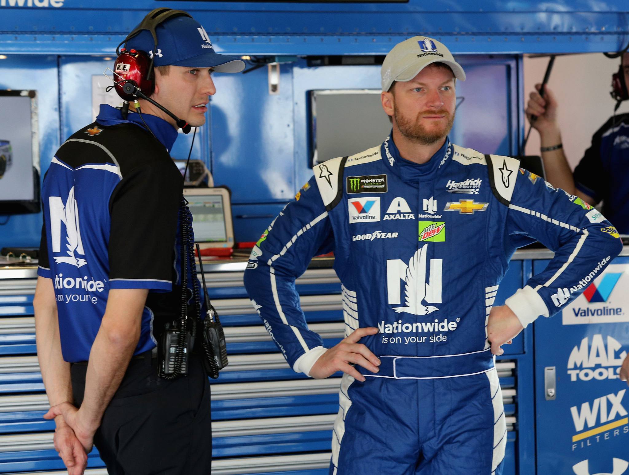 (Jerry Markland | NASCAR Media) Dale Earnhardt Jr. stands in the garage during practice for the Monster Energy NASCAR Cup Series 59th Annual DAYTONA 500 at Daytona International Speedway. Earnhardt Jr. returned to racing after leaving last season with concussion issues and may not race after the 2017 season.
