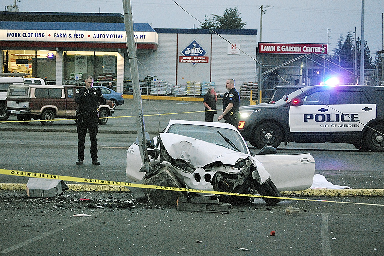 An Aberdeen man was killed after his 2001 Hyundai Tiburon left the roadway at Boone and Scott Street in South Aberdeen and struck a power pole in front of Swanson’s Market shortly before 5 p.m. Tuesday. (BOB KIRKPATRICK|THE DAILY WORLD)