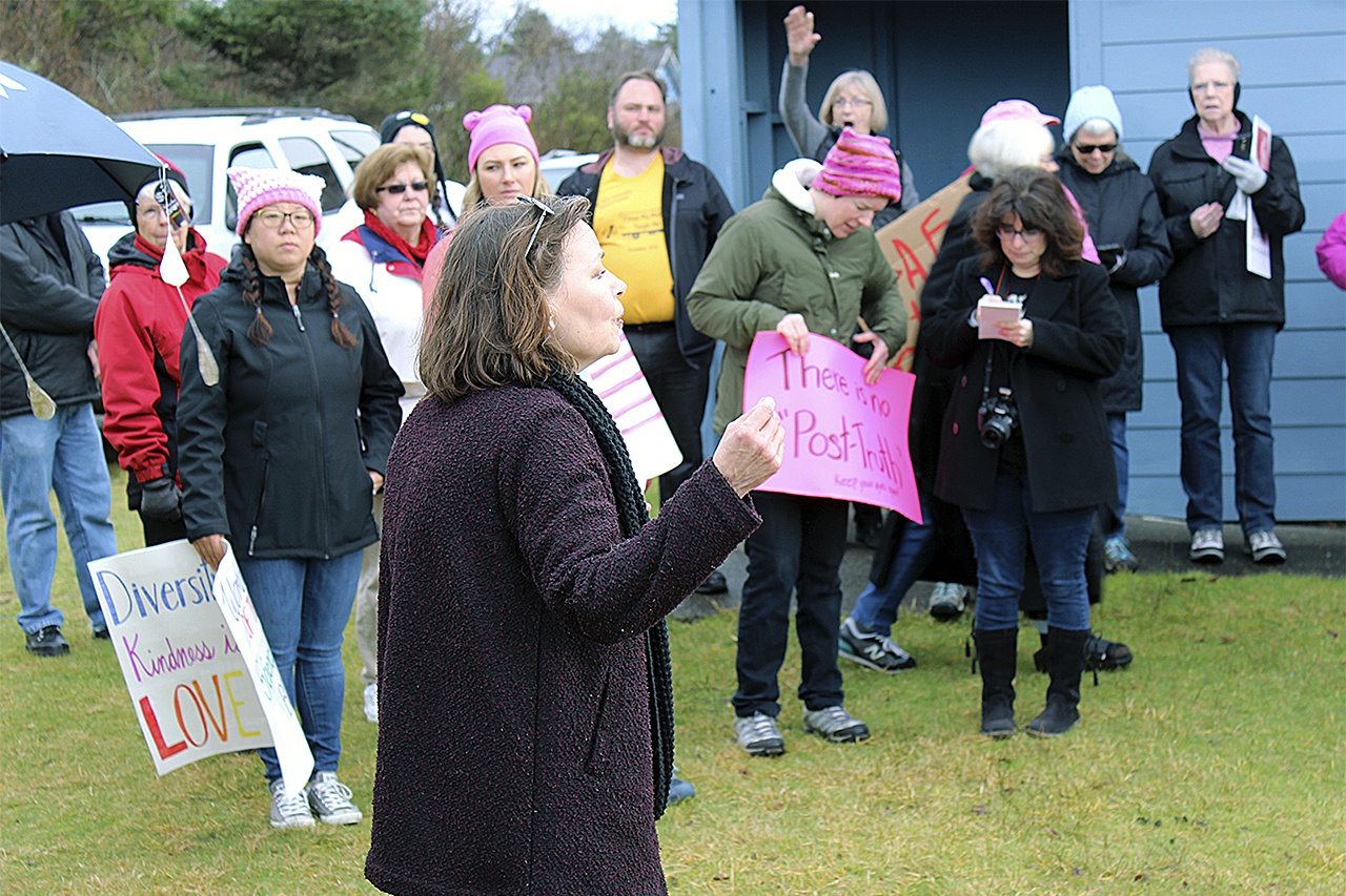 Shannon Vandenbush, one of the organizers of the North Beach Women’s March, addresses the crowd after the event. (North Coast News Photo)