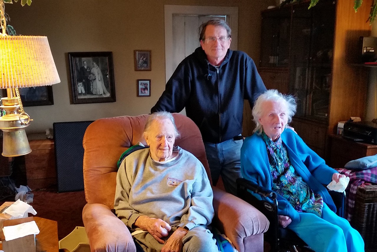 Don Norkoski stands between his parents John and Mary. The Cosmopolis husband and wife have both celebrated their 100th birthdays and have been married 78 years. (Terri Harber|The Daily World)
