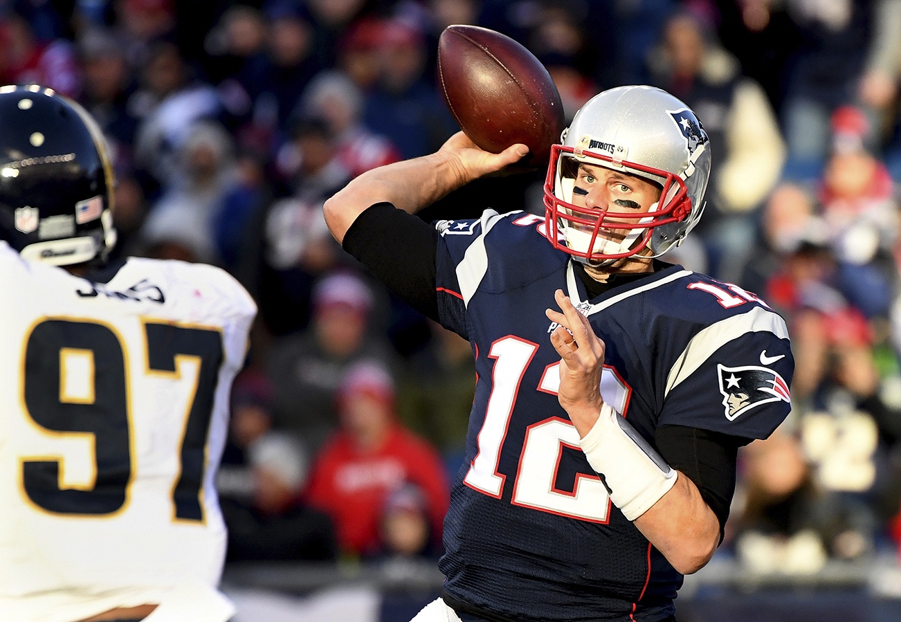 New England Patriots quarterback Tom Brady gets a pass off against the Los Angeles Rams in December. Brady will try to pass plenty against the Falcons on Sunday. (Wally Skalij | Los Angeles Times)