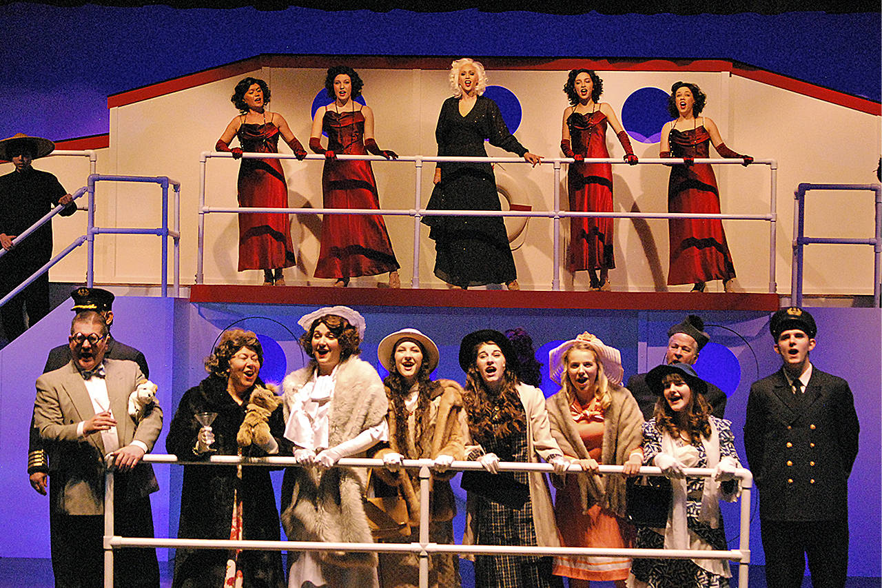 A portion of the cast sings a number from “Anything Goes,” which opens Friday night for a two-weekend run at the Bishop Center for the Performing Arts. (BOB KIRKPATRICK|THE DAILY WORLD)