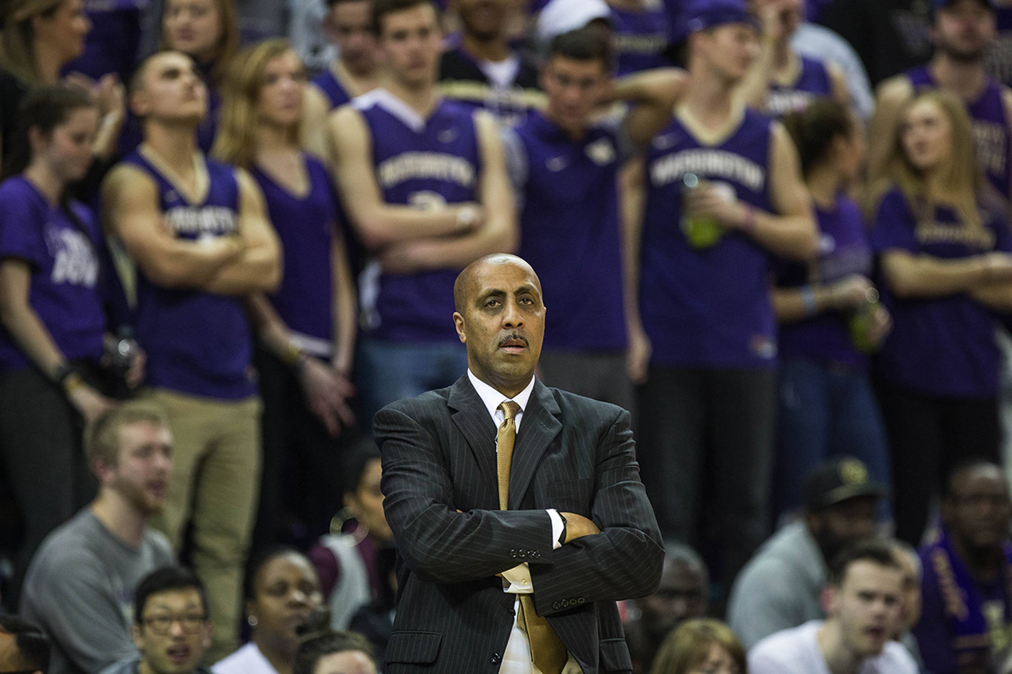 Report: Lorenzo Romar will remain at UW, but Huskies say they’re still evaluating