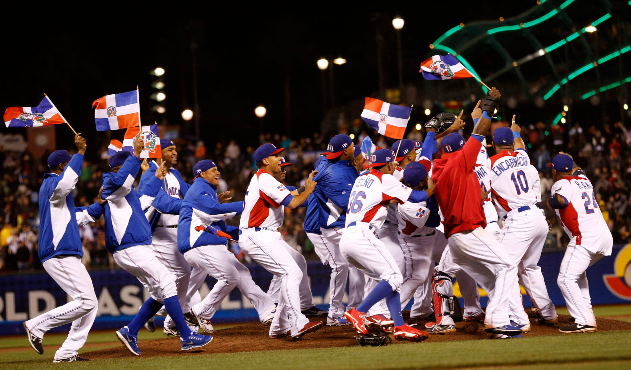 (Josie Lepe | San Jose Mercury News) The Dominican Republic team celebrates its win over Puerto Rico in the 2013 World Baseball Classic championship game at AT&T Field in San Francisco. The Dominicans, along with the United States and other major baseball-playing nations, will kick off WBC play today.