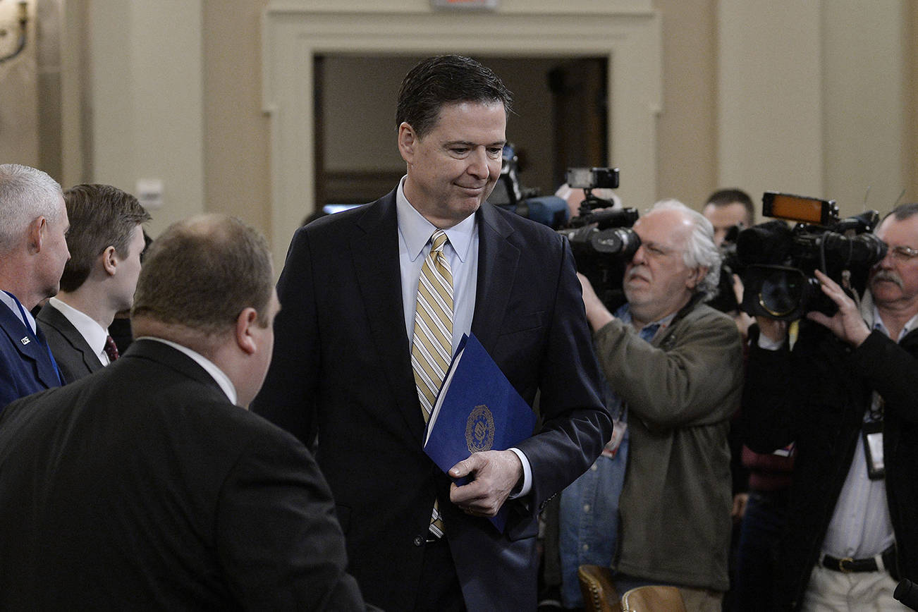 Olivier Douliery/Abaca Press                                 James Comey, director of the Federal Bureau of Investigation (FBI), testifies before a House Intelligence Committee hearing Monday.