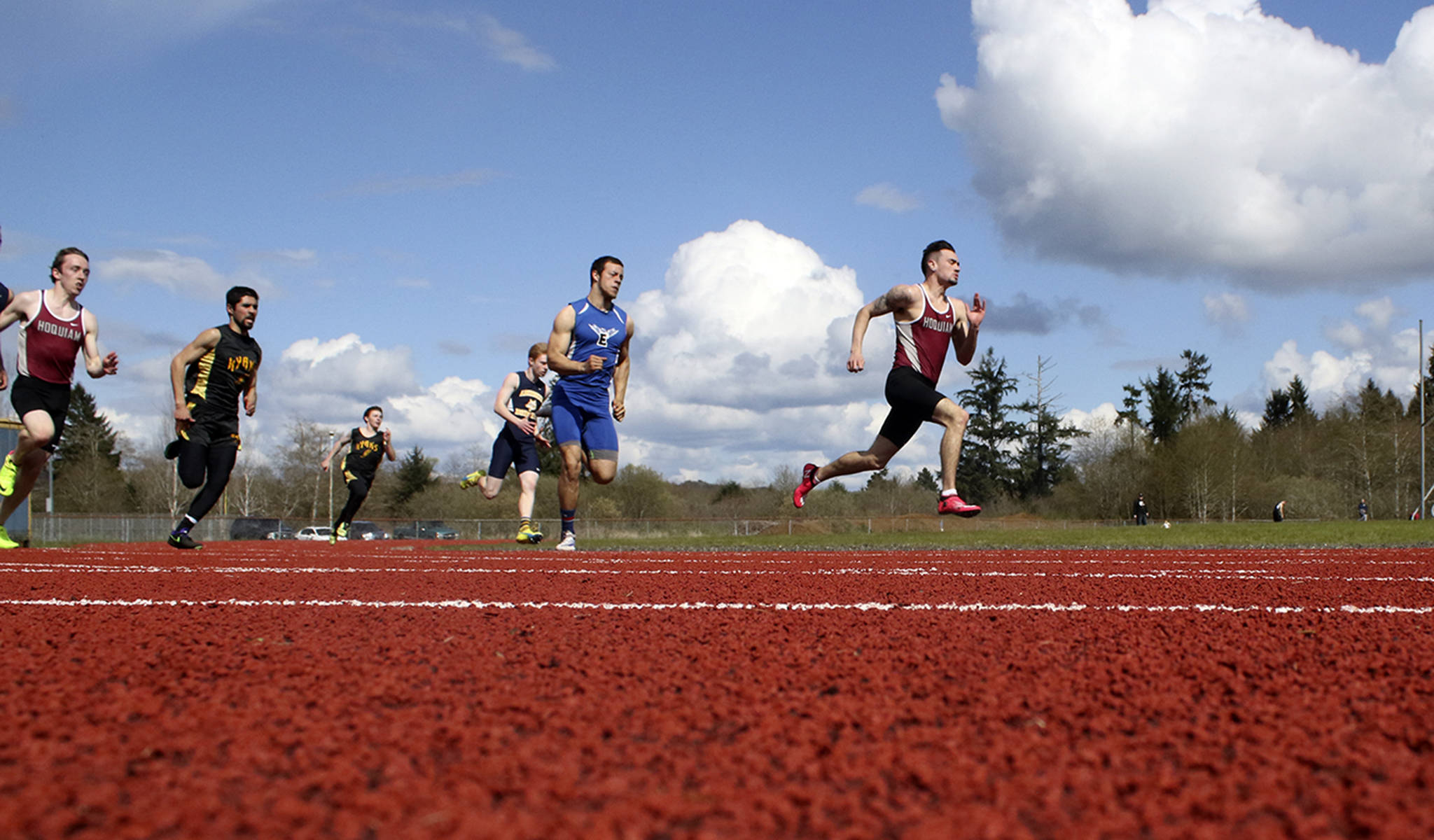 (Brendan Carl | The Daily World) Hoquiam’s Anthony Nash leads the field in the 200 during the Ray Ryan Memorial Grays Harbor All-County Track & Field Championships on Saturday. Nash was selected as the male athlete of the meet.