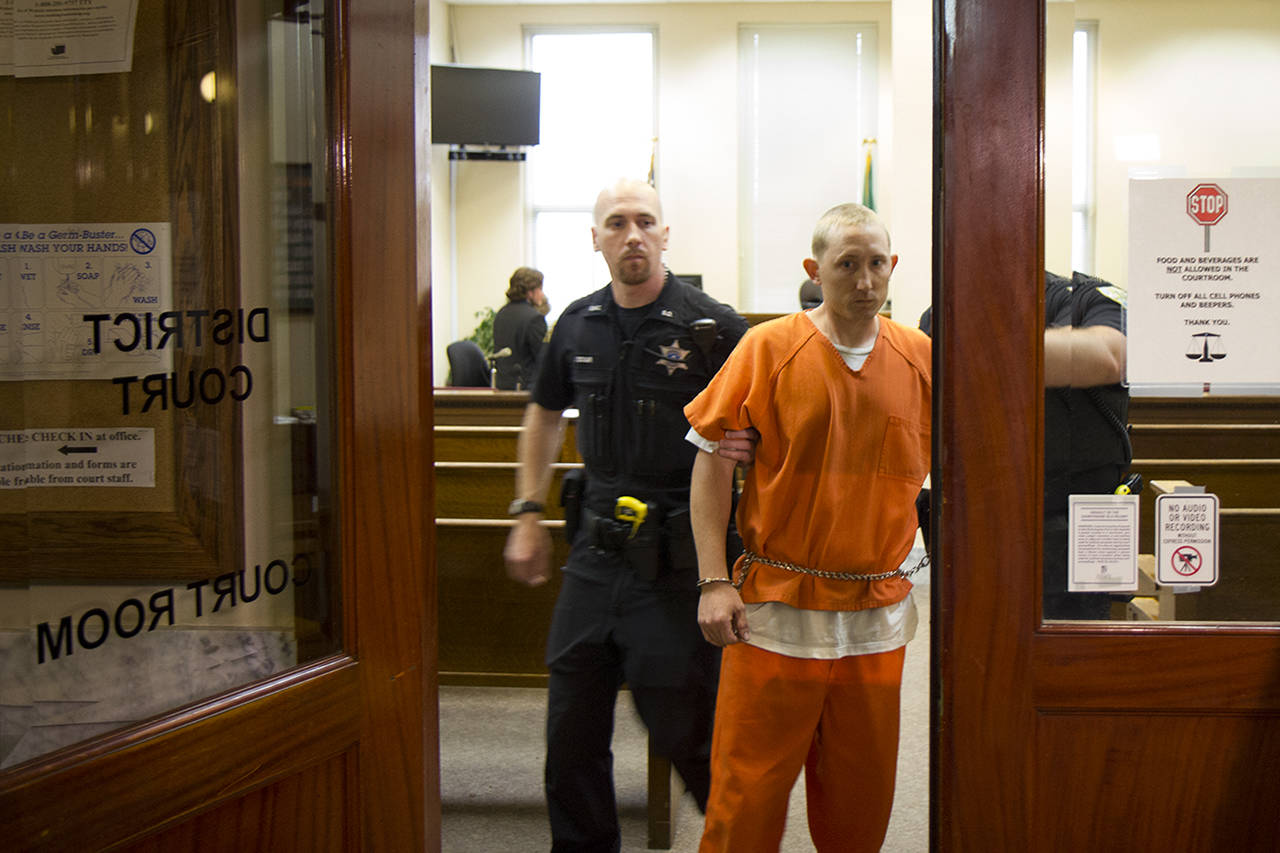(Corey Morris | The Vidette) James D. Walker is escorted from the Grays Harbor County District Court courtroom on May 31 following an initial court appearance. Walker is being charged with 2nd-degree homicide in connection with the incident at the Donkey Creek Campground in Grays Harbor County on May 27 in which two young men were run over by a truck.