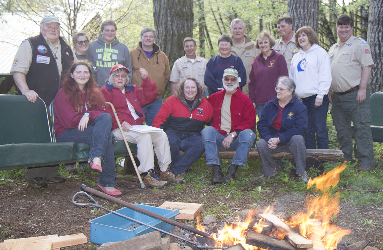 (Travis Rains | The Vidette) Longtime scouts and their families enjoyed a beautiful afternoon May 6 by telling camp stories around the fire at the decommissioning of Camp Delezenne in Elma.