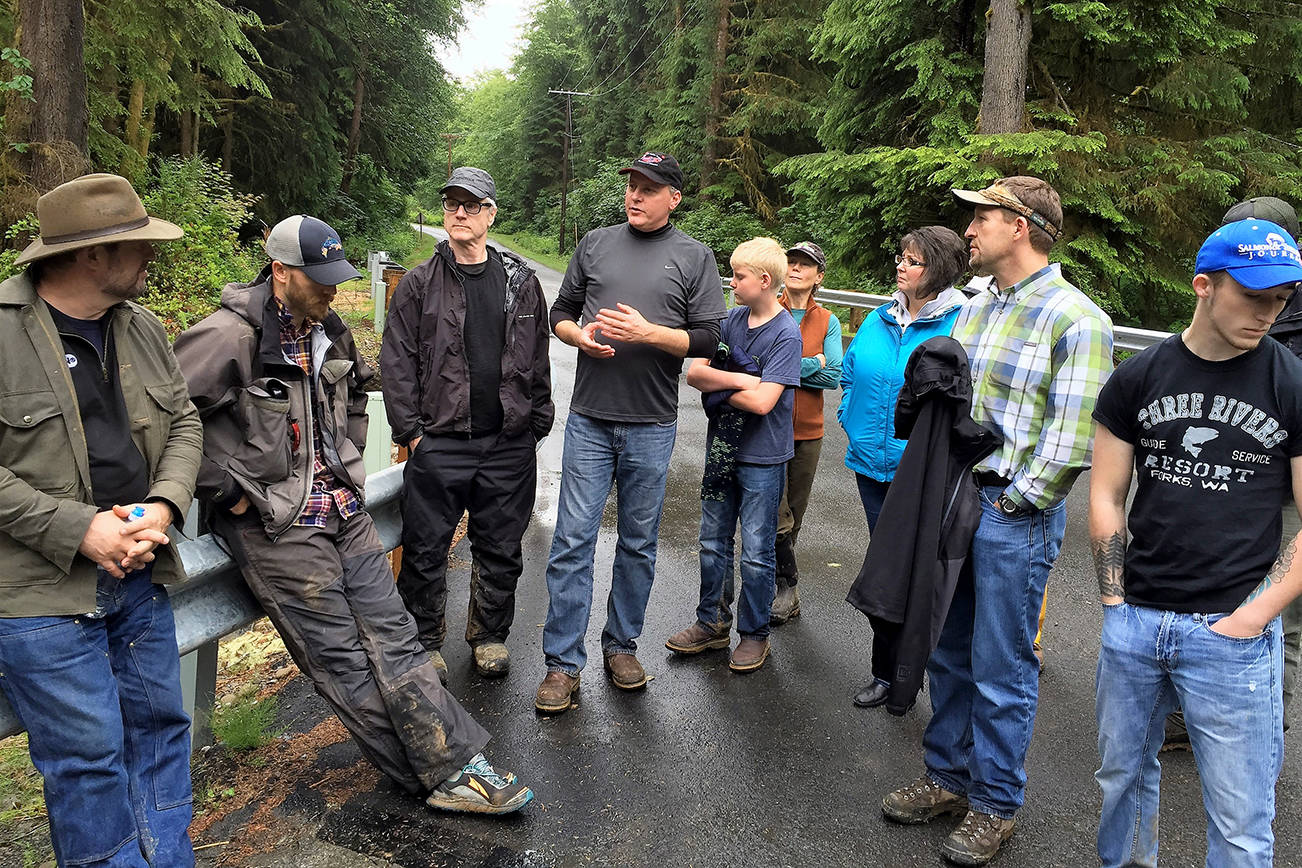 QUINAULT INDIAN NATION PHOTO                                Participants of last year’s tour of salmon restoration projects on the Quinault Indian Reservation pause to discuss the tribe’s effort to improve salmon habitat on the Queets and Quinault rivers. This year’s tour is slated for June 22.