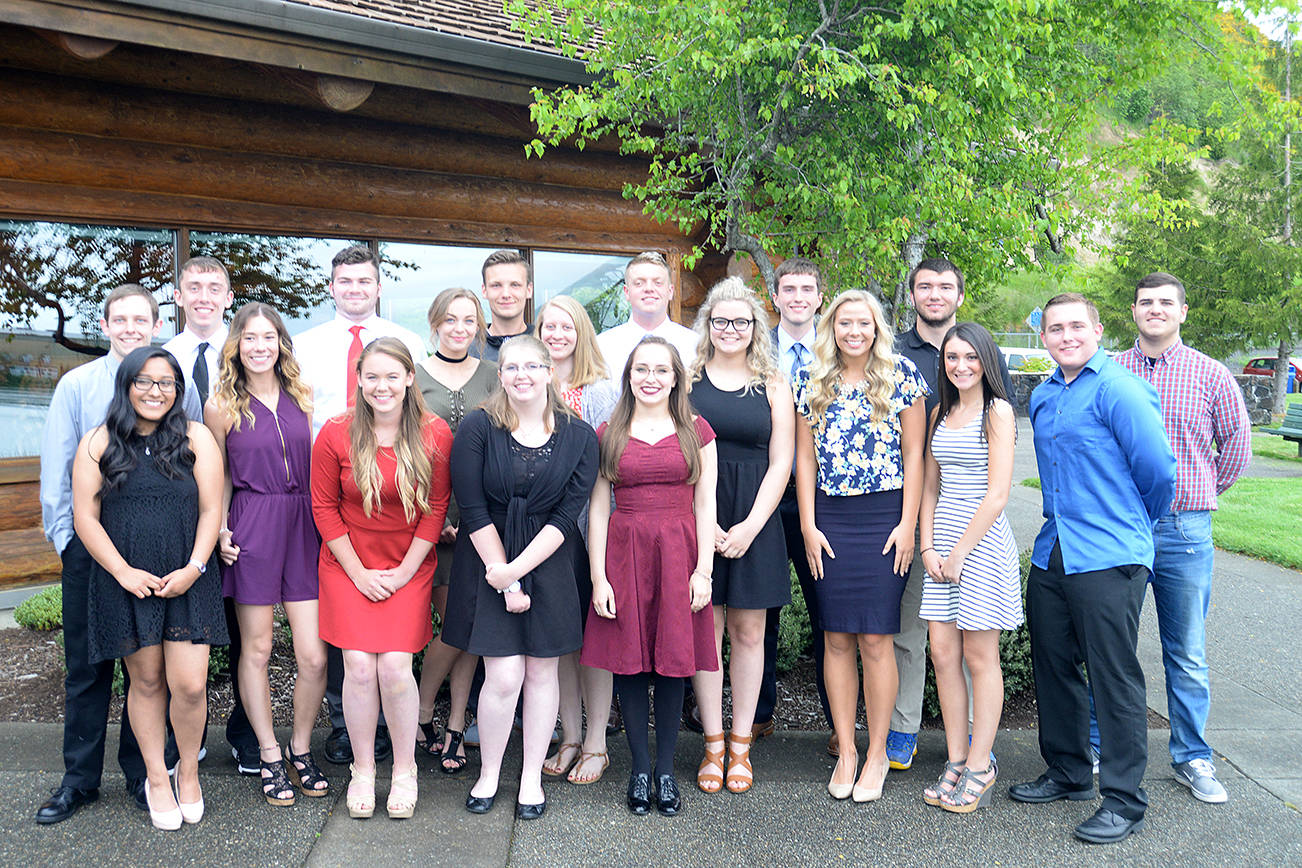 DAN HAMMOCK | THE DAILY WORLD                                Students from Aberdeen and Hoquiam high schools were honored for their dedication to community service at the 26th annual Silver and Gold Banquet Wednesday evening at the Rotary Log Pavilion. Front row, left to right: Eva Ortiz-Cruz, Alexis Wonderly-Leonard (in purple), Paige Folkers and Katie Mudd from Hoquiam; and Haley Fleming from Aberdeen. Middle row, left to right: Brandon Ford, Courtney McCormick and Kayla Robinette from Hoquiam; Bailey Harper, Haley Farrer, Taylor Nichols and Jacob Jamieson (in blue shirt) from Aberdeen. Back row, left to right: Christopher Smith (with black tie), Dylan Moodenbaugh and Jace Varner from Hoquiam; Jake Metke, Grant Larson, Braden Castleberry-Taylor and Trace Christensen from Aberdeen.