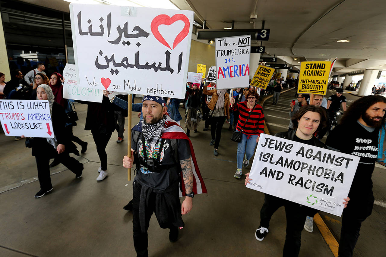 Protesters against the travel ban gather at the Tom Bradley International Terminal at LAX in Los Angeles in February. (Luis Sinco/Los Angeles Times)