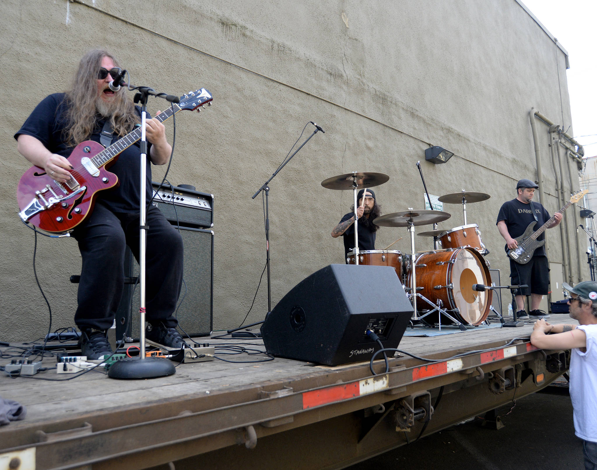 (Dan Hammock | The Daily World) Electric General, a metal band from Olympia, performs during the Pay to Play festival — formerly known as Kurt Cobain Days — Saturday afternoon. Pictured from left are guitarist/vocalist Luke Krom, drummer Jay Einspahr and John Calvin Bell on bass. Ten bands were slated to play starting at 11 a.m. Saturday in the alley behind Boomtown Records on East Wishkah in Aberdeen.