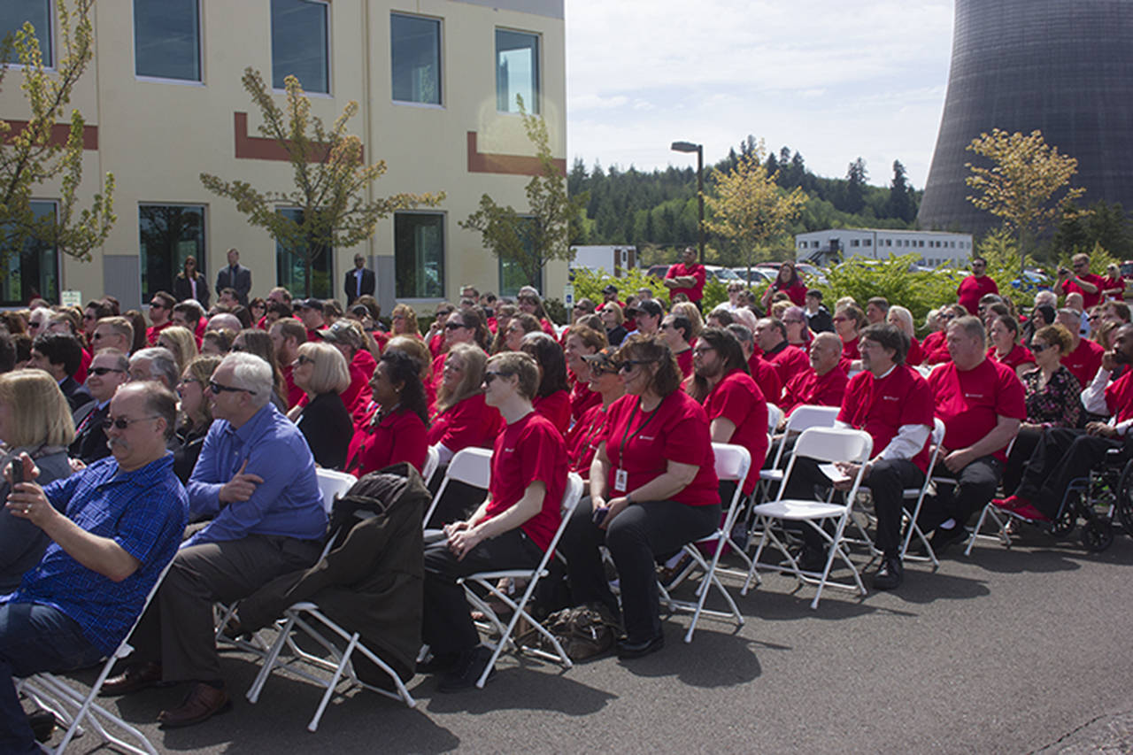 (Corey Morris | GH Newspaper Group) Members of the public and Overstock.com employees listen to speeches during a ribbon cutting ceremony at Satsop Business Park in May.