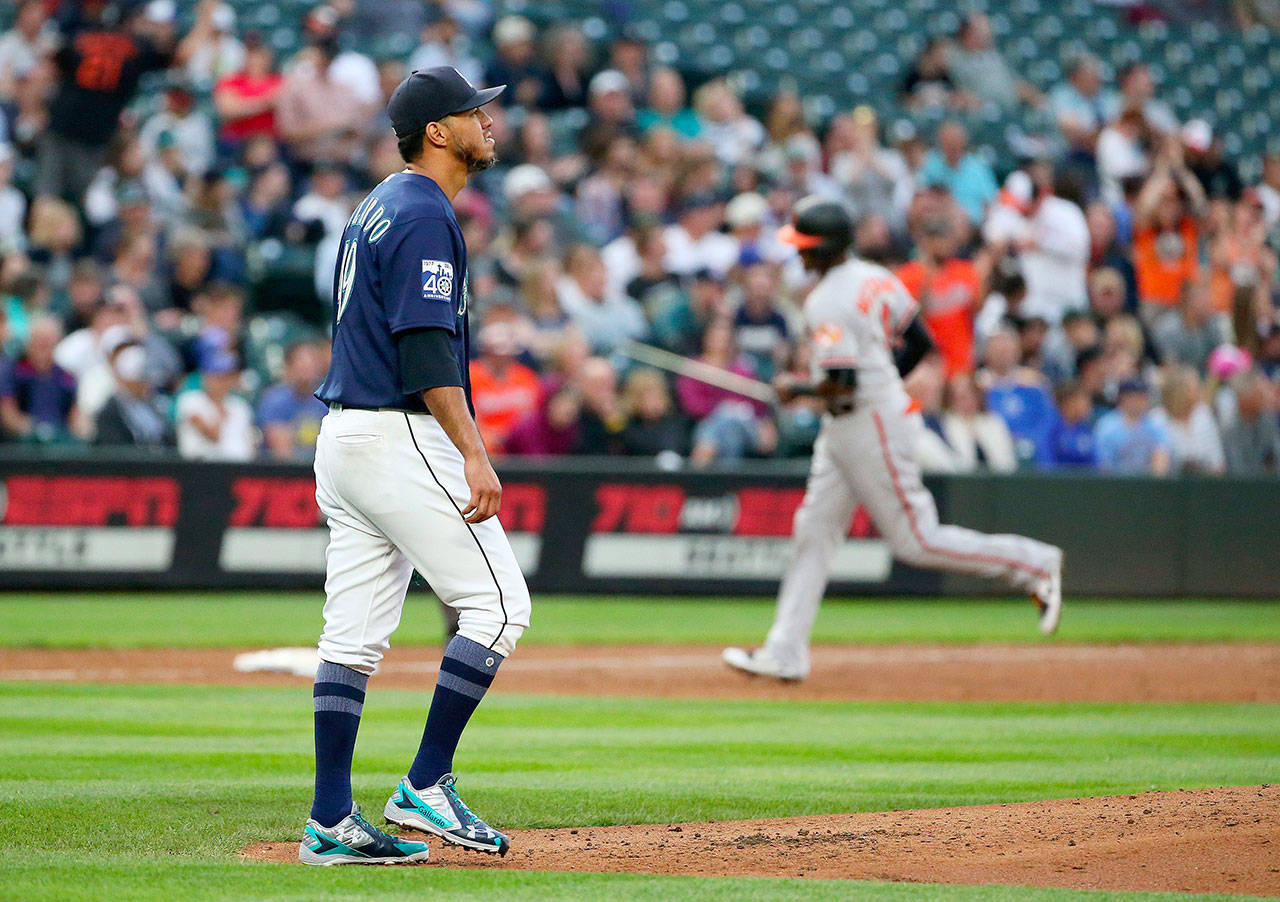 Mariners starting pitcher Yovani Gallardo returns to the mound after giving up a grand slam to Baltimore in the second inning, Monday, Aug. 14, 2017, at Safeco Field in Seattle. (Ken Lambert/Seattle Times/TNS)