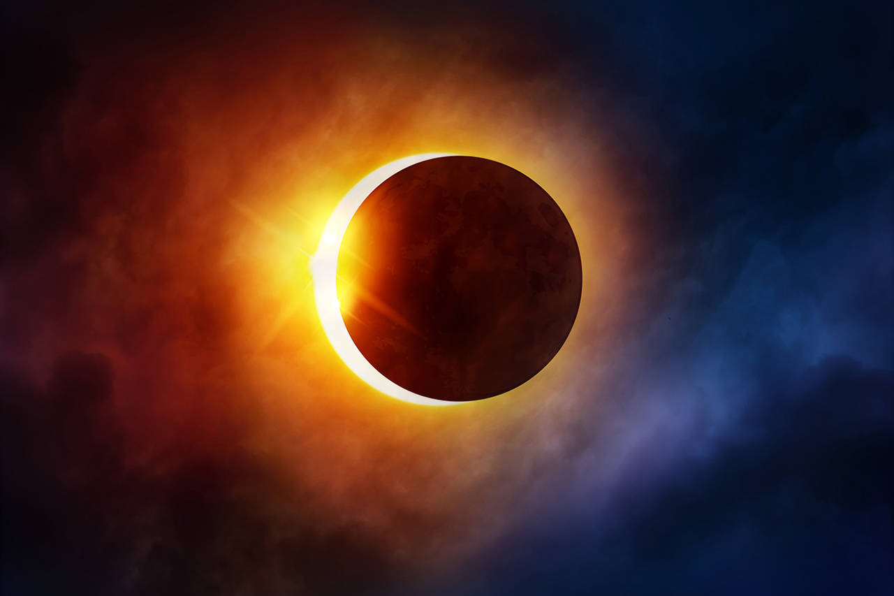 Dreamstime | TNS                                 With your solar glasses or a special viewer, watch for the partial phases of the eclipse as the moon passes over the sun, a stage that lasts for a few hours.