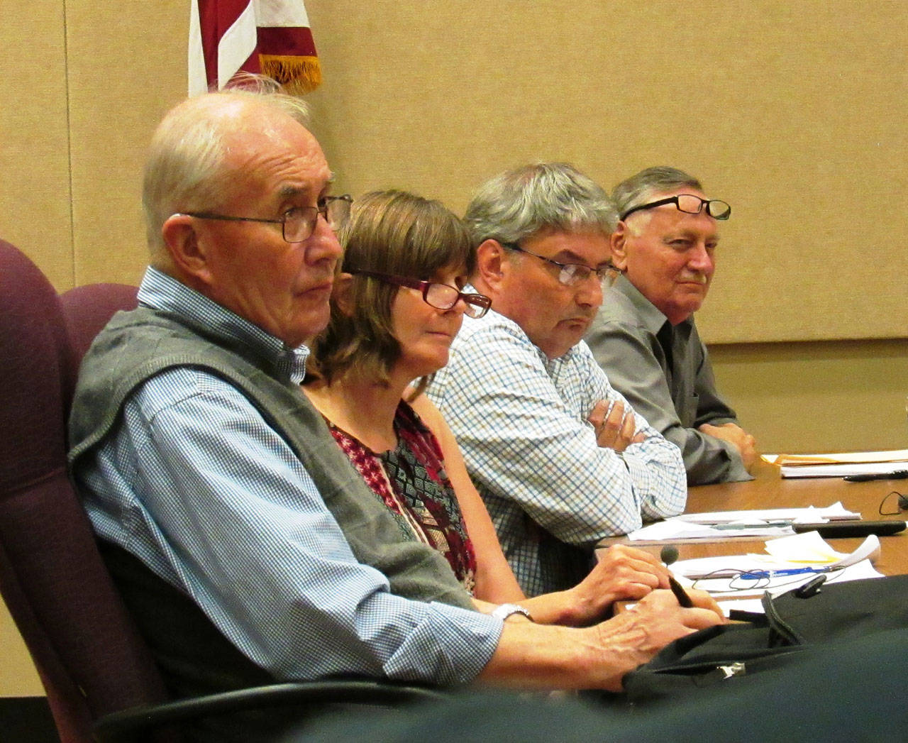 Scott Johnston photo: John Lynn, Lisa Griebel, Jon Martin and Gordon Broadbent of the Ocean Shores City Council listen to a presentation on Block Watch during the Aug. 21 study session on public safety.
