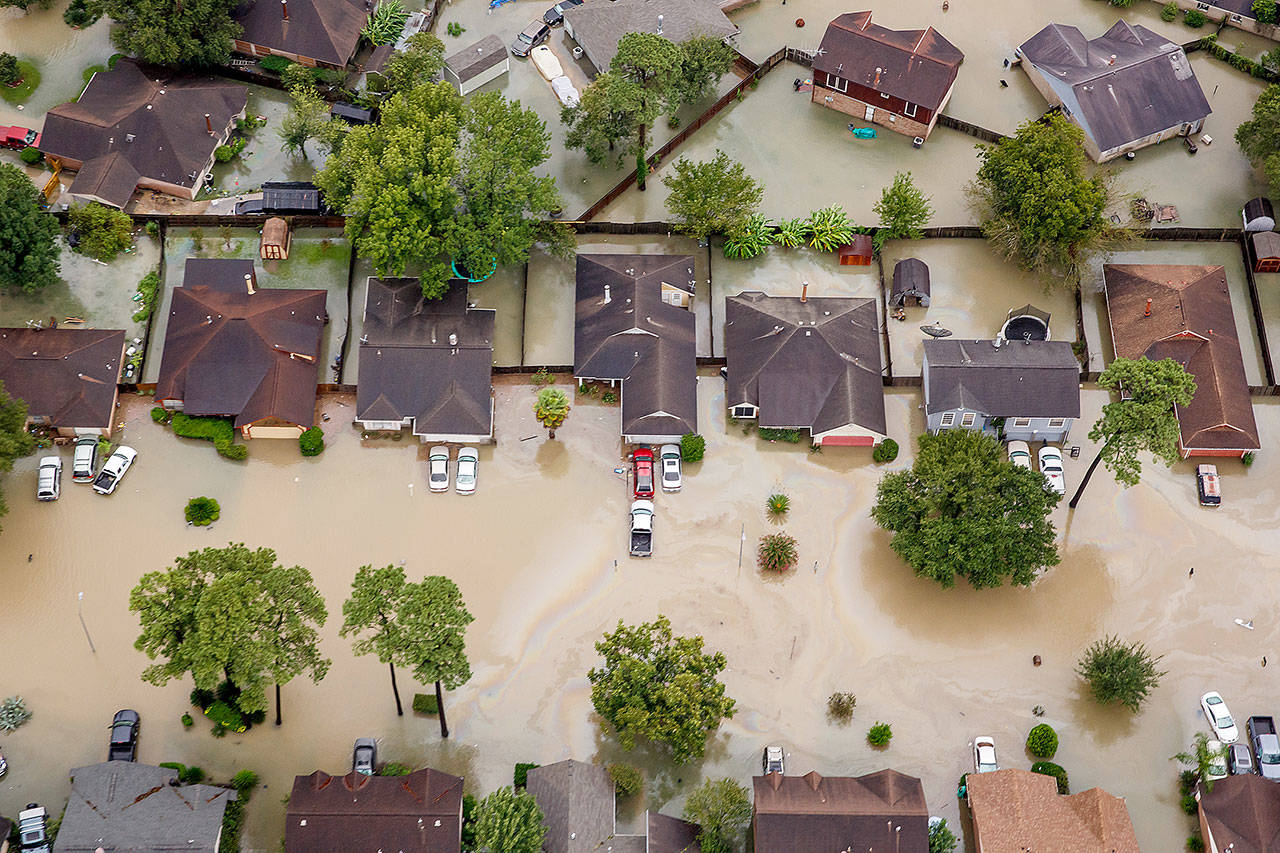 Residential neighborhoods near the Interstate 10 sit in floodwater in the wake of Hurricane Harvey in Houston. (Marcus Yam/Los Angeles Times)