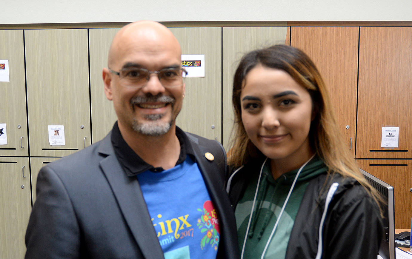 DAN HAMMOCK | THE DAILY WORLD                                Aberdeen student Neysa Alaniz stands beside Latinx founder Bill Fishburn of the Hispanic Roundtable at Grays Harbor College Friday.
