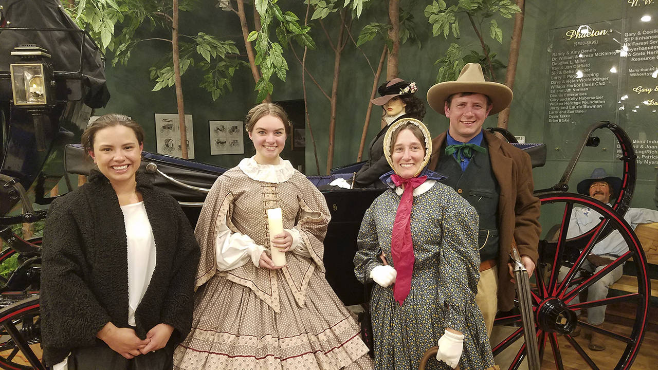 (Courtesy photo) From left, actors Gracie Manlow, Mary Cooley and Scott and Pam Newman played 19th century characters Saturday at “An Enchanted Evening,” a fundraiser for the Northwest Carriage Museum in Raymond.