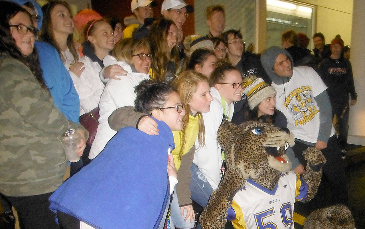 DAN HAMMOCK | THE DAILY WORLD                                An ecstatic group of Aberdeen High School students celebrate with their Bobcat mascot after being named the winners of the 2017 Food Ball competition Monday evening.