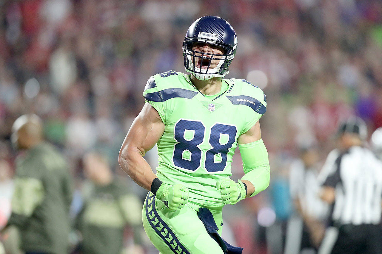 Seattle Seahawks tight end Jimmy Graham celebrates his 6-yard, first-quarter touchdown reception against the Arizona Cardinals at University of Phoenix Stadium on Sunday. (Bettina Hansen/Seattle Times)