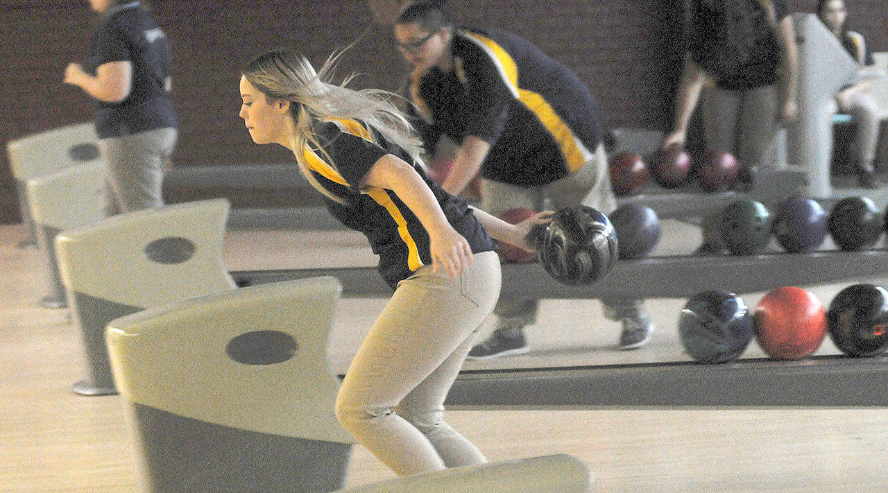 Meghan Howell of Aberdeen warms up prior to Wednesday’s bowling match against Olympia at Rainier Lanes. (Hasani Grayson | The Daily World)