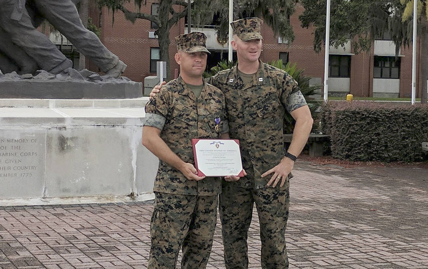 Roy Calica received a Purple Heart at Parris Island Marine Corps Recruit Depot in South Carolina in July. The 2000 Hoquiam High School graduate suffered burns in an attack at Bastion Air Base in Afghanistan in 2012.