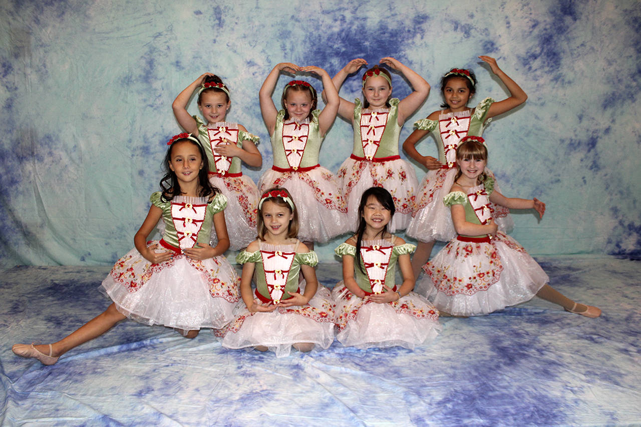 Courtesy photos                                 Grays Harbor Dancers perform “Petite Papa Noel” (above) and “Little St. Nick” (right).