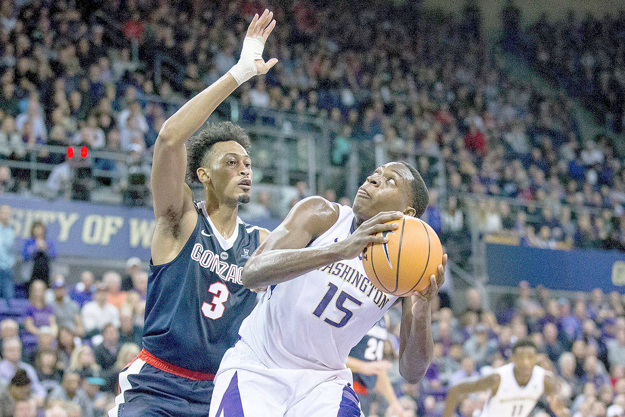 Washington Huskies forward Noah Dickerson (15) looks to shoot against Gonzaga Bulldogs forward Johnathan Williams (3) during the first half on Sunday, Dec. 10, 2017 at Alaska Airlines Arena in Seattle, Wash. (Courtney Pedroza/Seattle Times/TNS