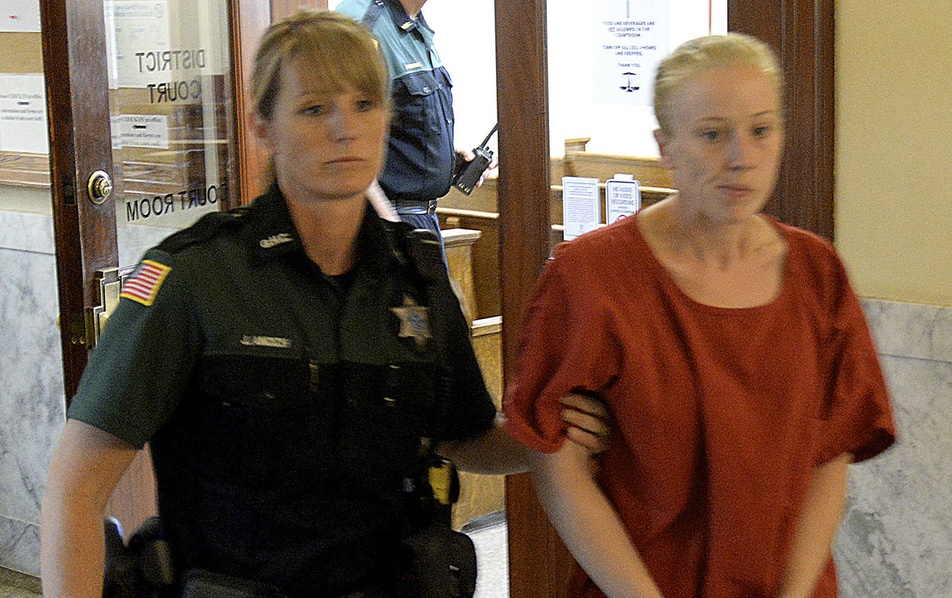 Dan Hammock | The Daily World                                Kirsten Alice O’Hara, 30, of Hoquiam is led out of her first court appearance in July of last year. She plead guilty Dec. 23 to stabbing and beating her 95-year old neighbor to death and is facing more than 28 years in prison when she is sentenced in February.