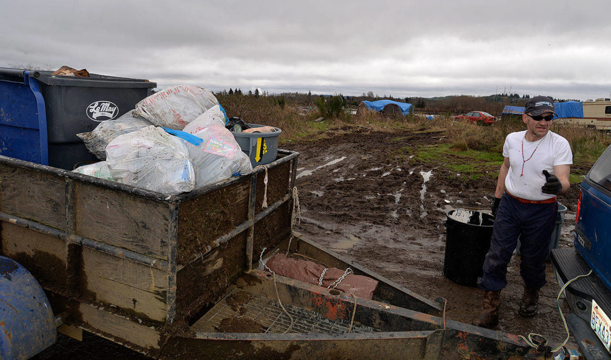 As garbage mounts in Aberdeen riverfront camps, Revival’s director