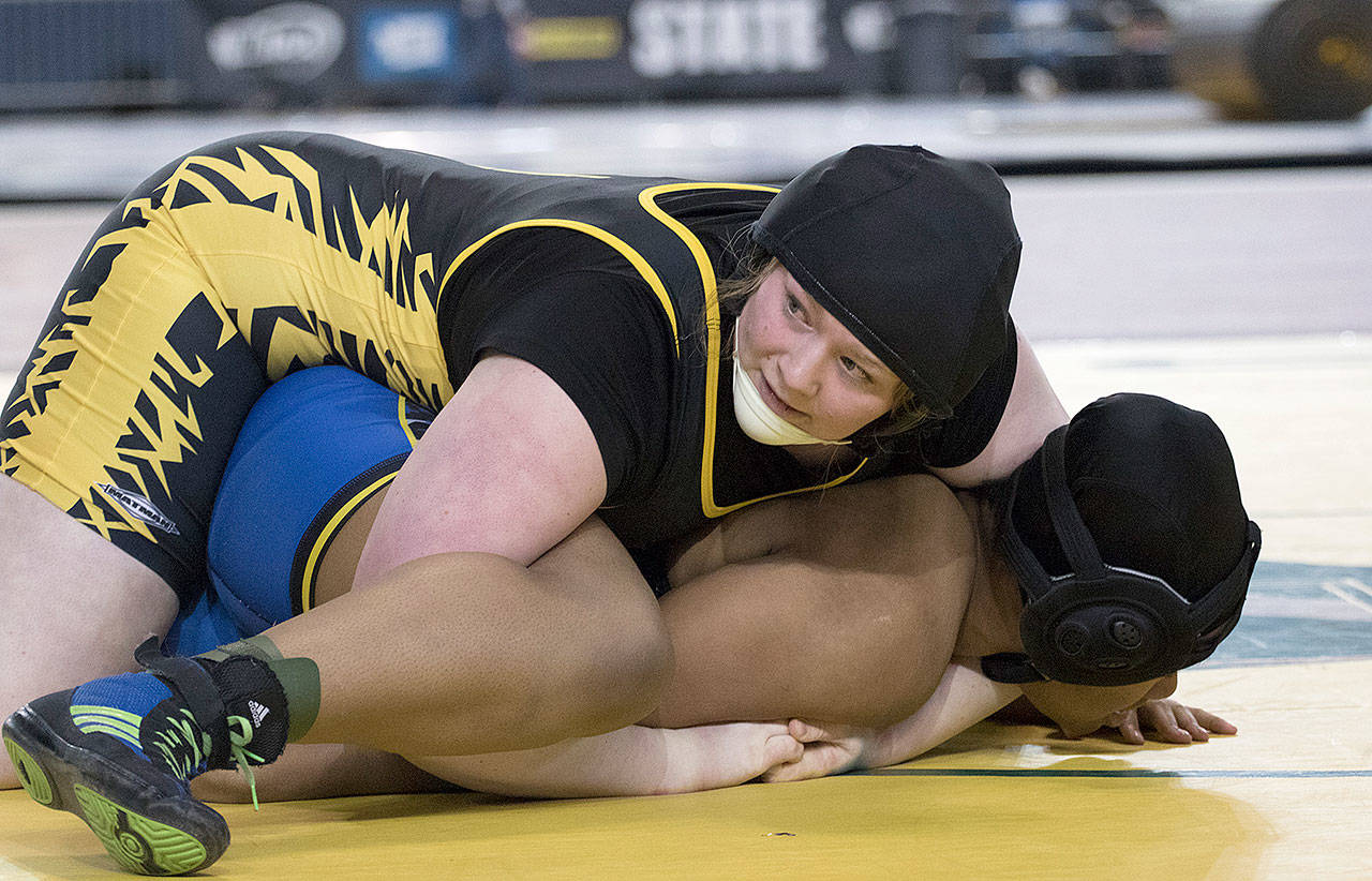 North Beach’s Natasha Fruh works to put Veronique Abaglo of Fife into a cradle during the 235-pound third/fourth-place match on Saturday. (Brendan Carl Photography)