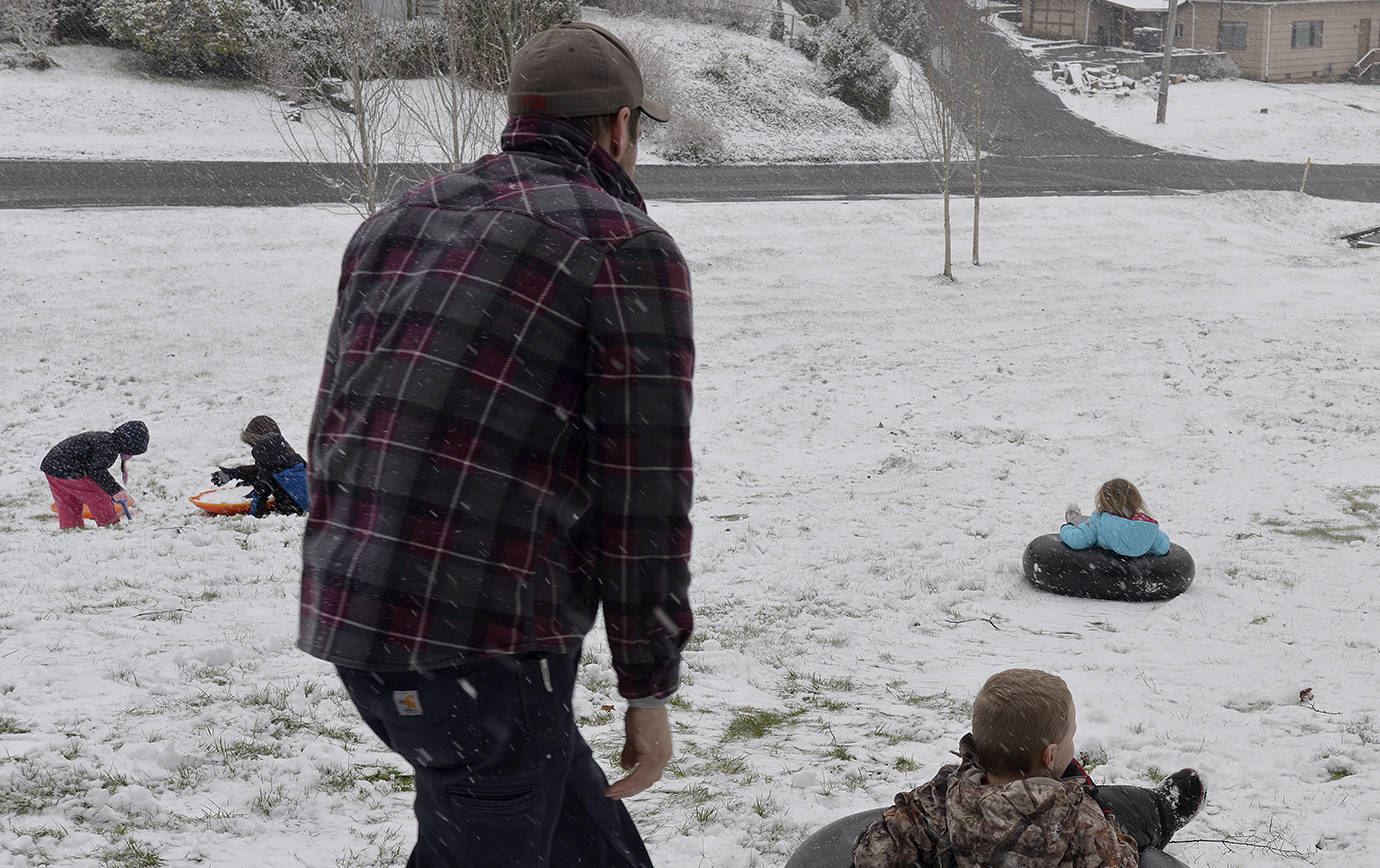 Snow day means sledding for youngsters at Sam Benn Park Tuesday