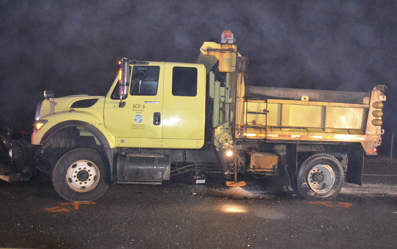 WASHINGTON STATE PATROL Photo                                The Department of Transportation truck that was spreading sand and salt before it was involved in a collision that resulted in the death of two Aberdeen residents on State Route 12 just west of Montesano early Sunday morning.